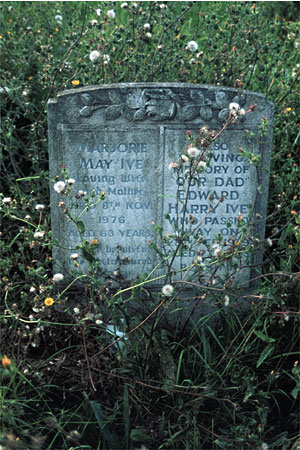 headstone with carved rose